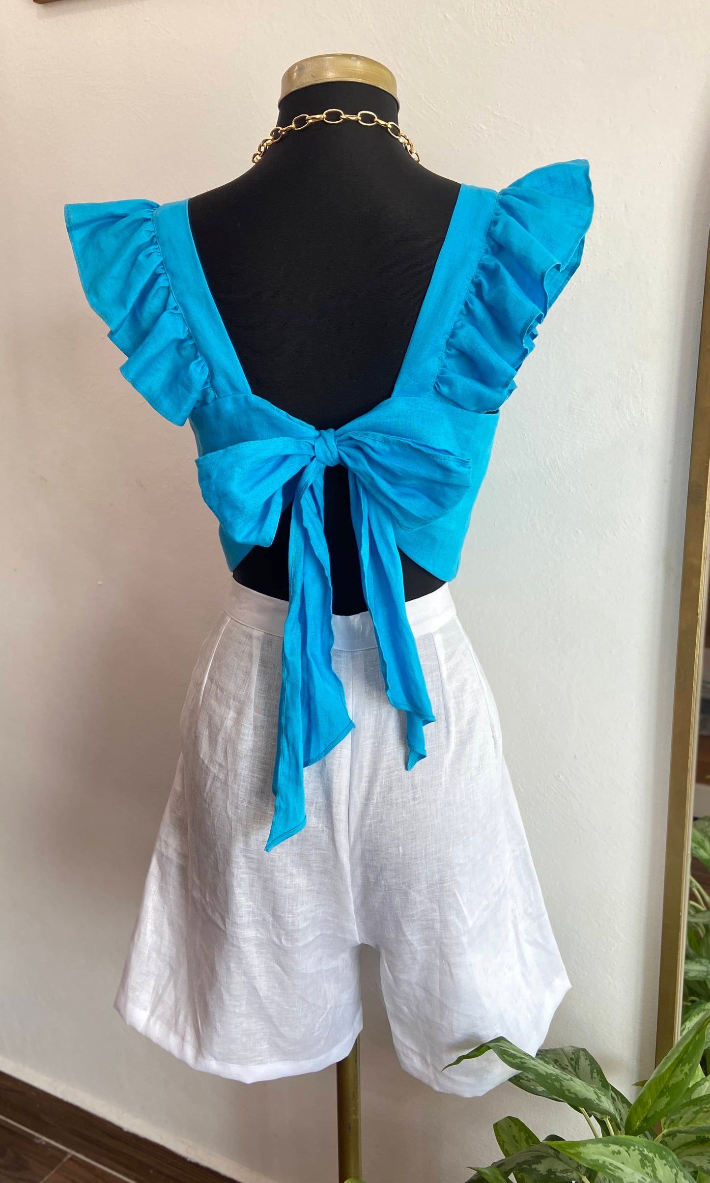 Blusa de moño azul peltre